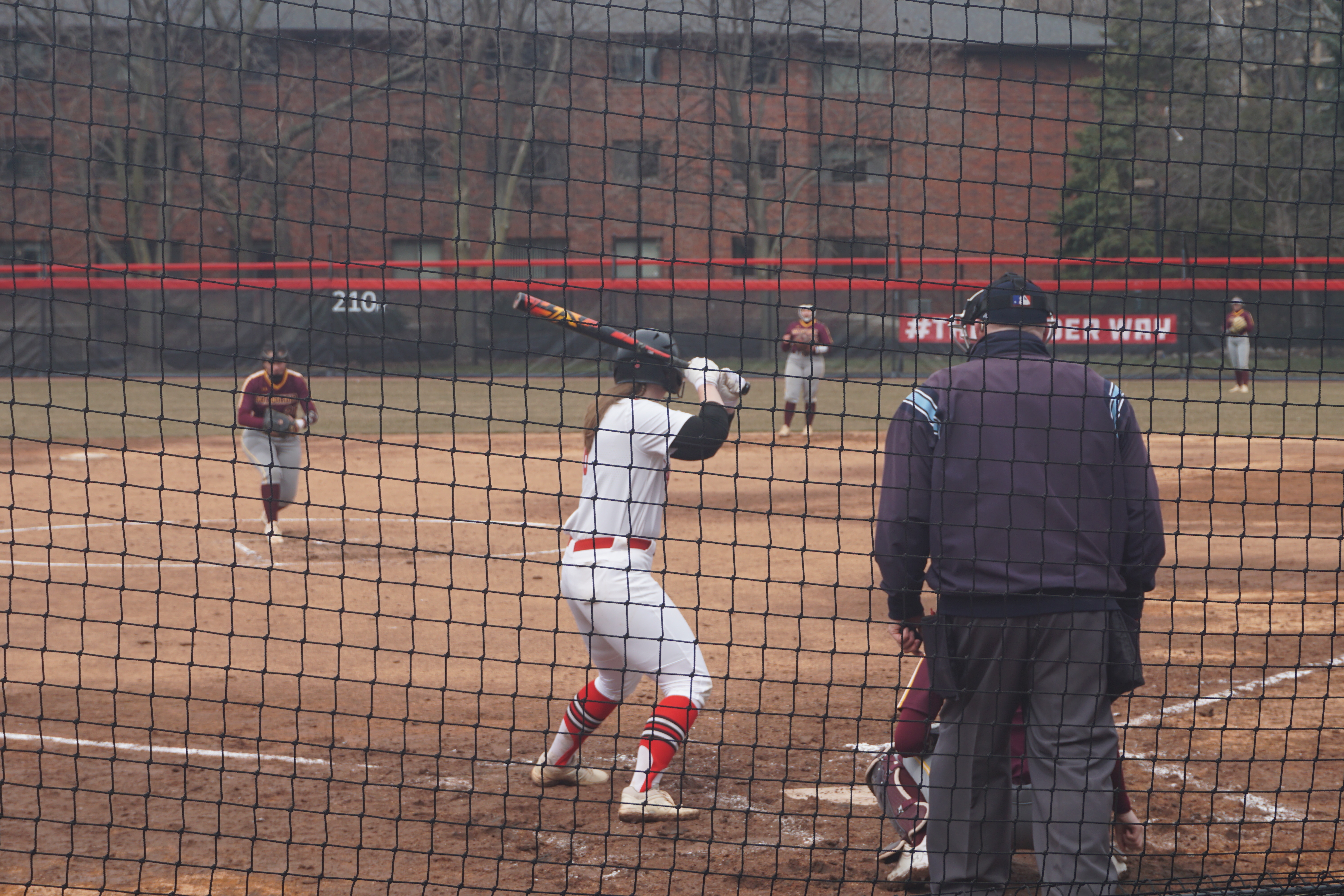 Players competing during a softball game